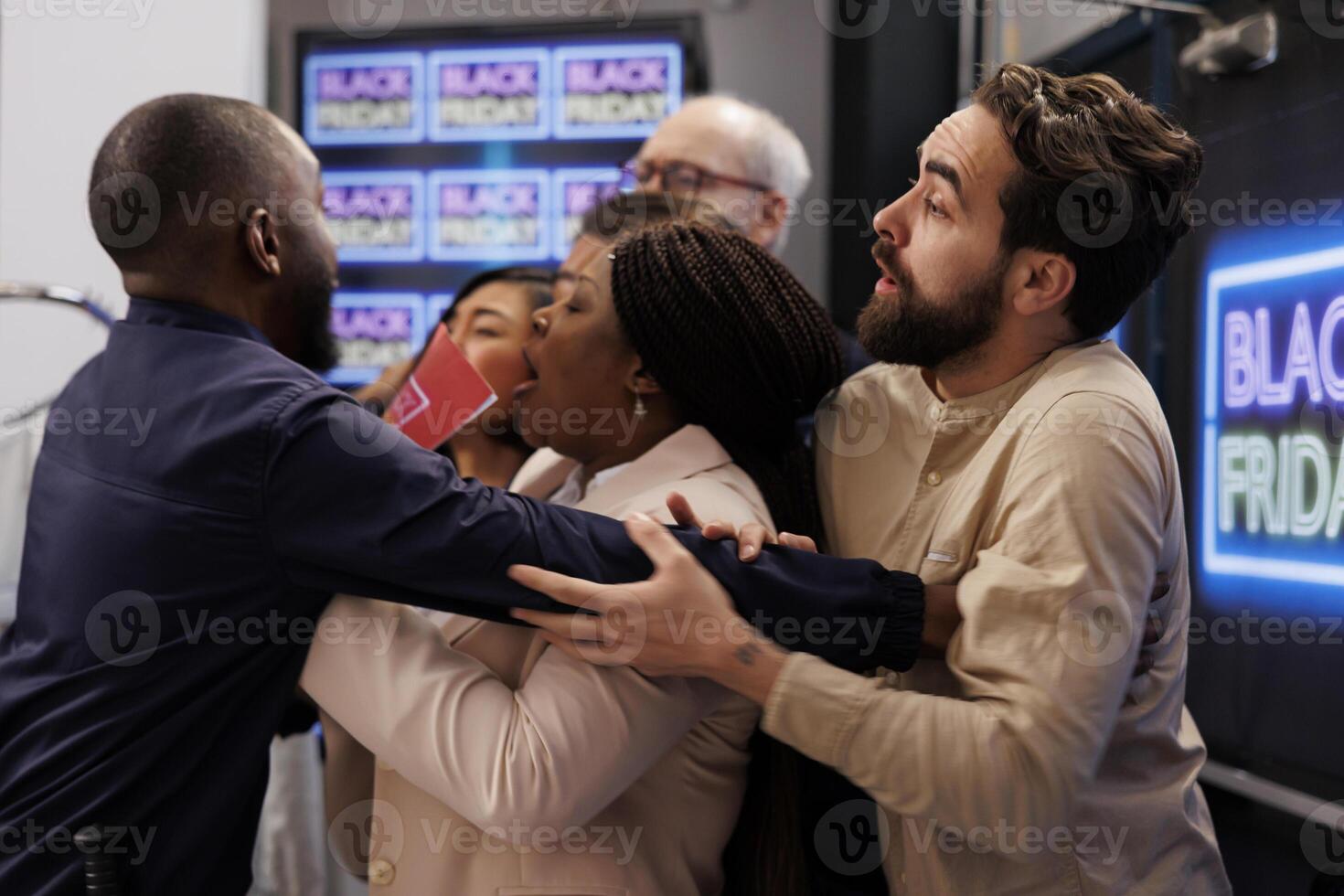 Angry mad shoppers fight over bargains, crowd of crazy frenzy diverse people pushing security guard and shoving through during Black Friday sales, trying to be first in store and get best deals photo