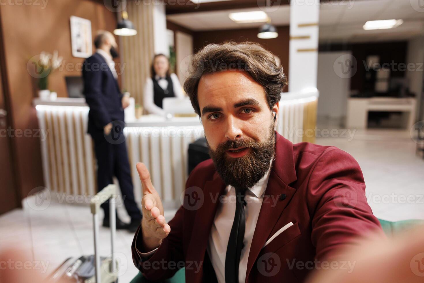 POV of businessman on videocall sharing international conference progress with entrepreneur at home. Business professional talking about new collaboration opportunities, hotel lounge area. photo