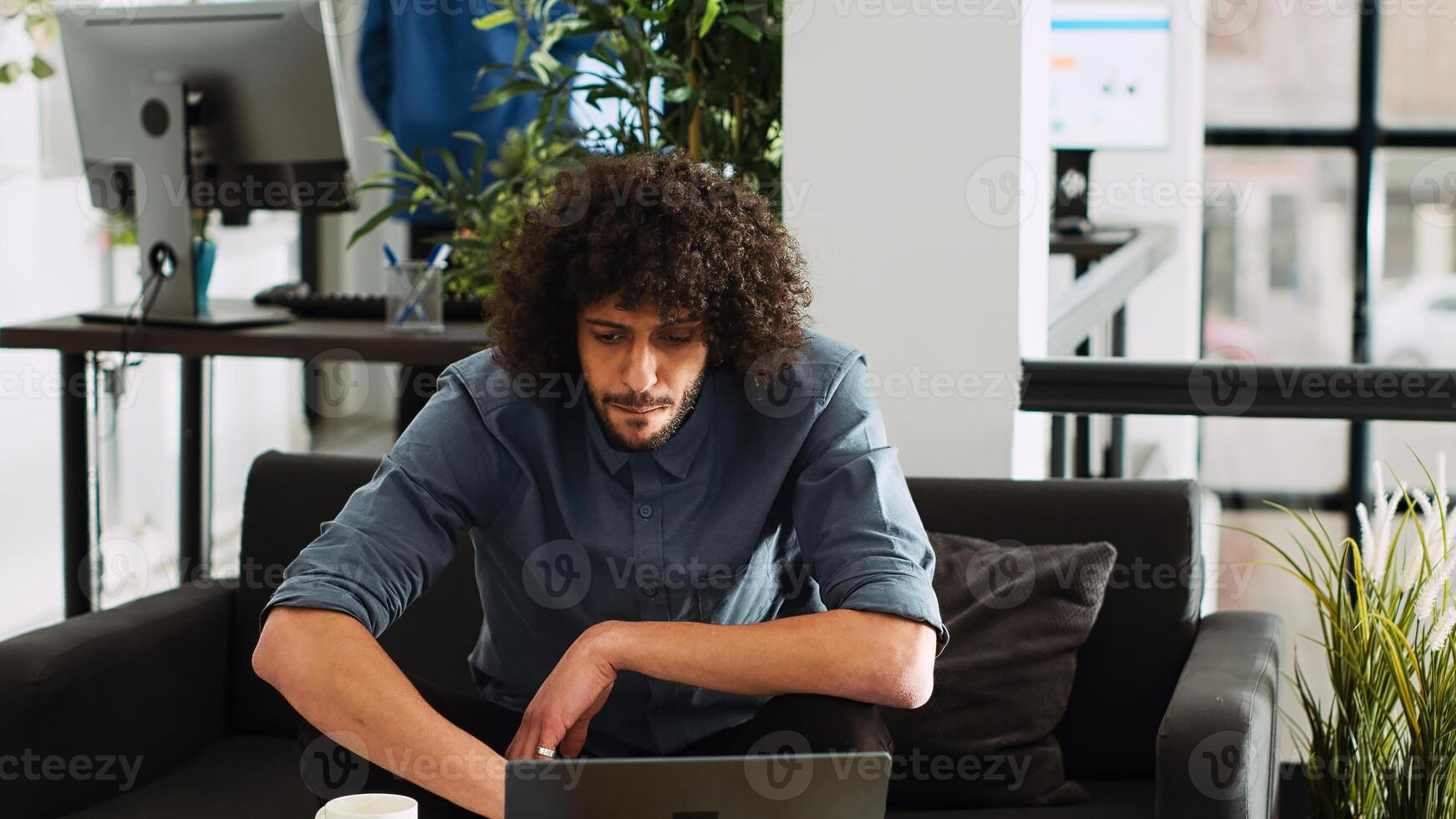 Executive assistant searches solution for new management strategy to try and develop small business sales. Coworking space employee analyzing statistics report in business office. photo