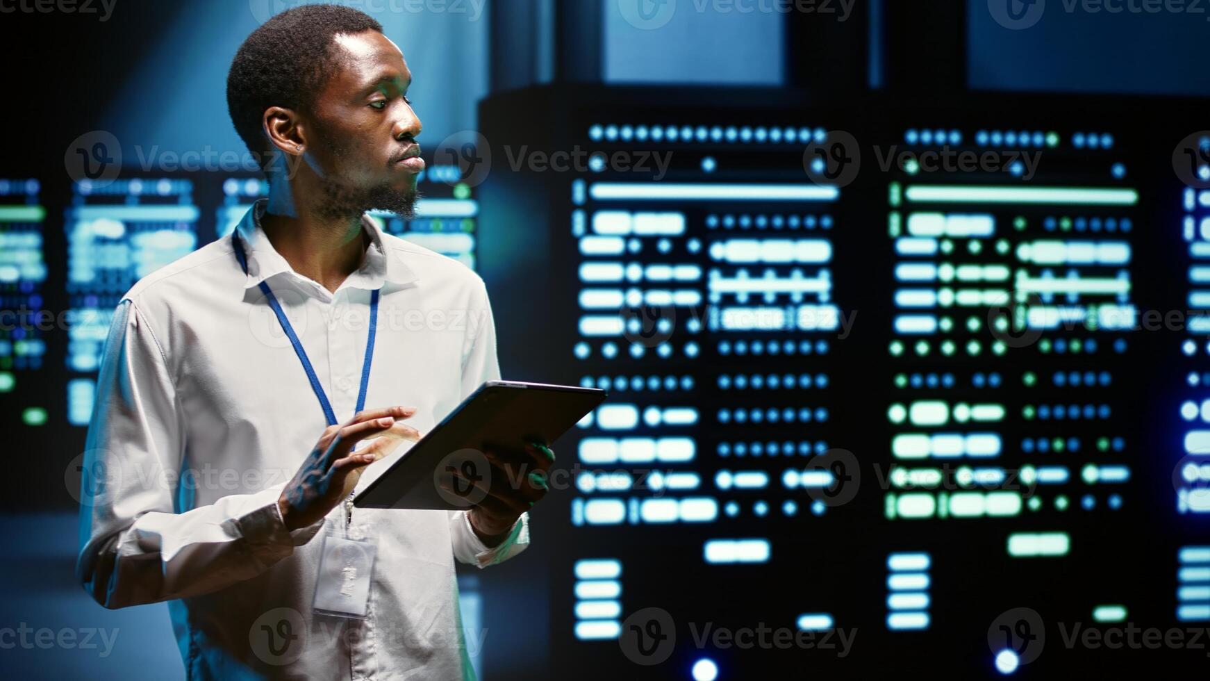 Serviceman in server hub walking through supercomputers used for computationally intensive tasks such as scientific simulations or 3D rendering. Worker doing annual equipment checkup photo