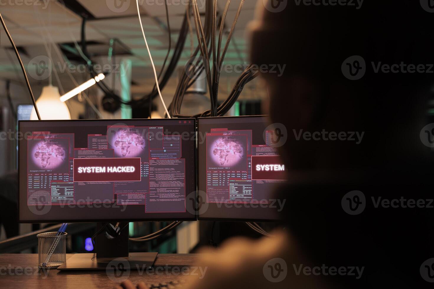 System hacked alert message on computer screen, hacker breaking into database server. Criminal cyberattack, malicious software, password cracking program, information stealing photo