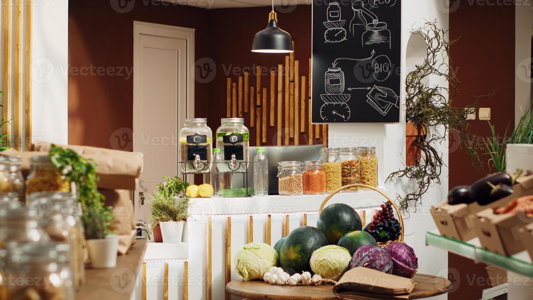 Bulk products supermarket with pesticides free fruits, vegetables, grains, spices and pasta on display. Empty eco friendly local grocery store with net zero carbon dioxide emissions photo
