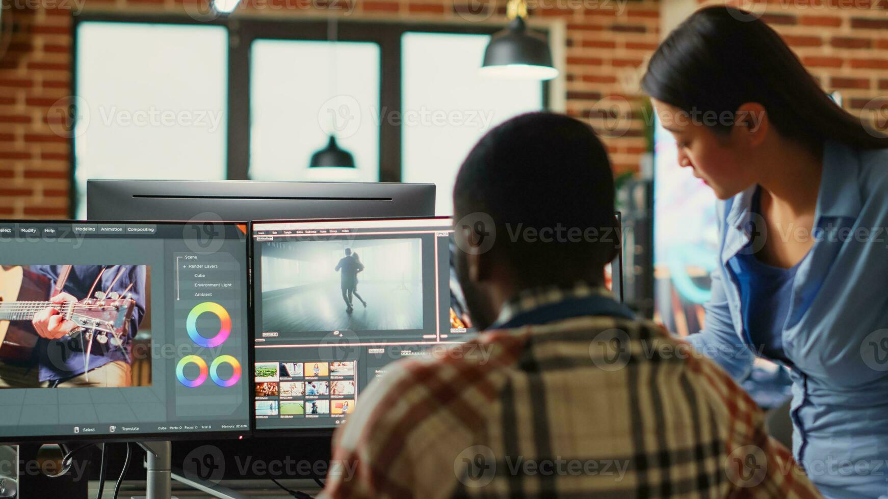 Professional video editors analyzing film montage before editing color grading and lighting, doing teamwork in creative office. Post production house employees working with video footage. photo