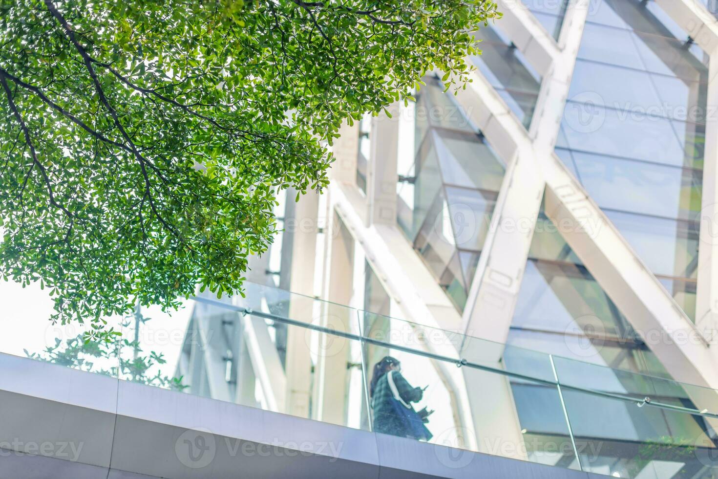 Green city, Green tree around urban office building for cool fresh air ozone saving energy. photo