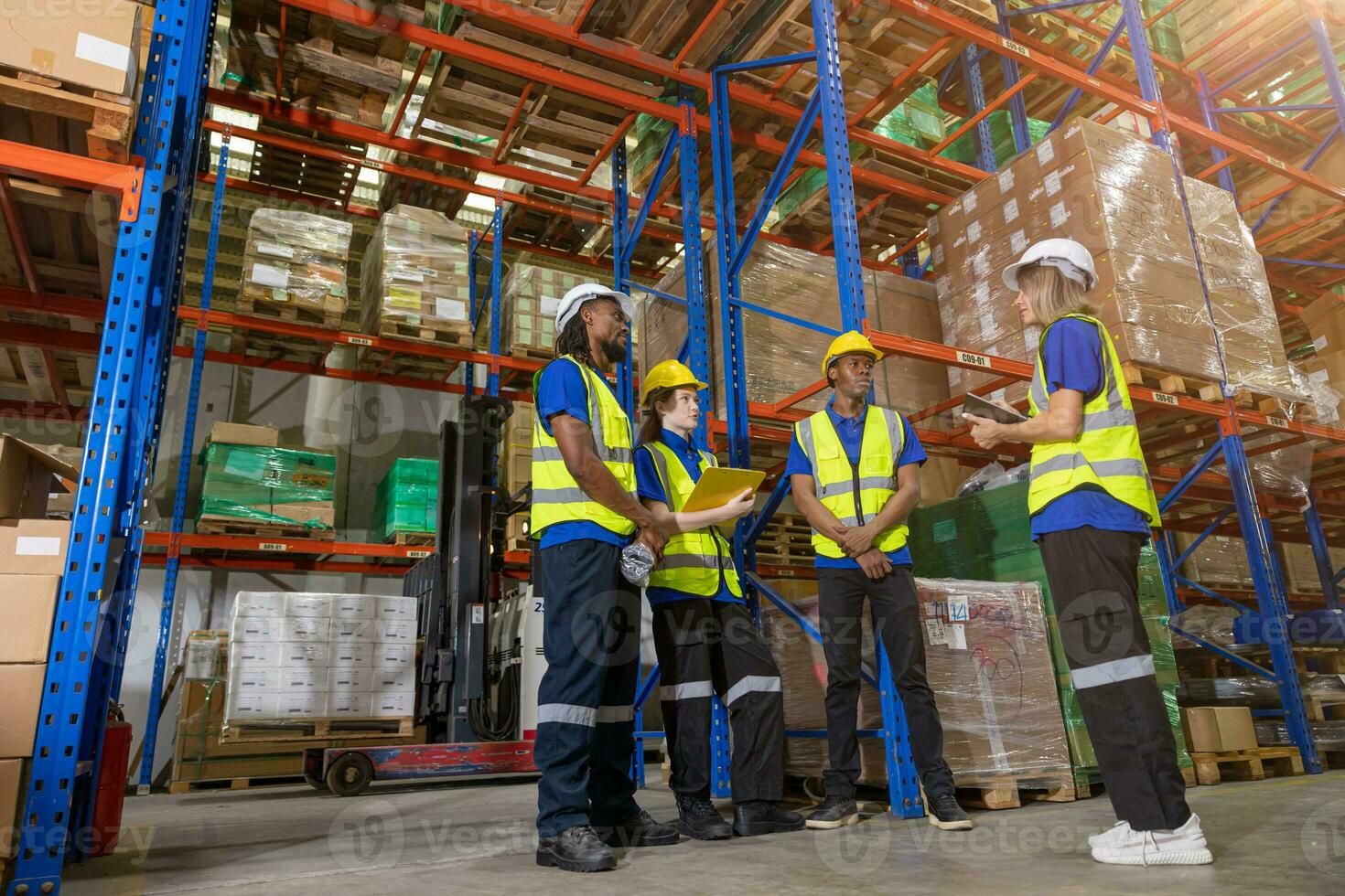 group of people worker in warehouse cargo storage meeting talking together work discussion with foreman manager for planning teamwork working photo