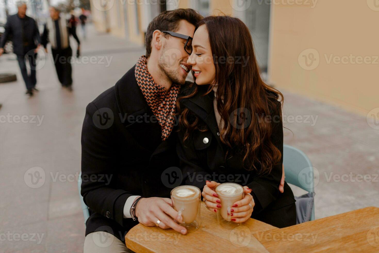 Elegant woman and man talking during first date in cafe,  enjoying  time together. photo