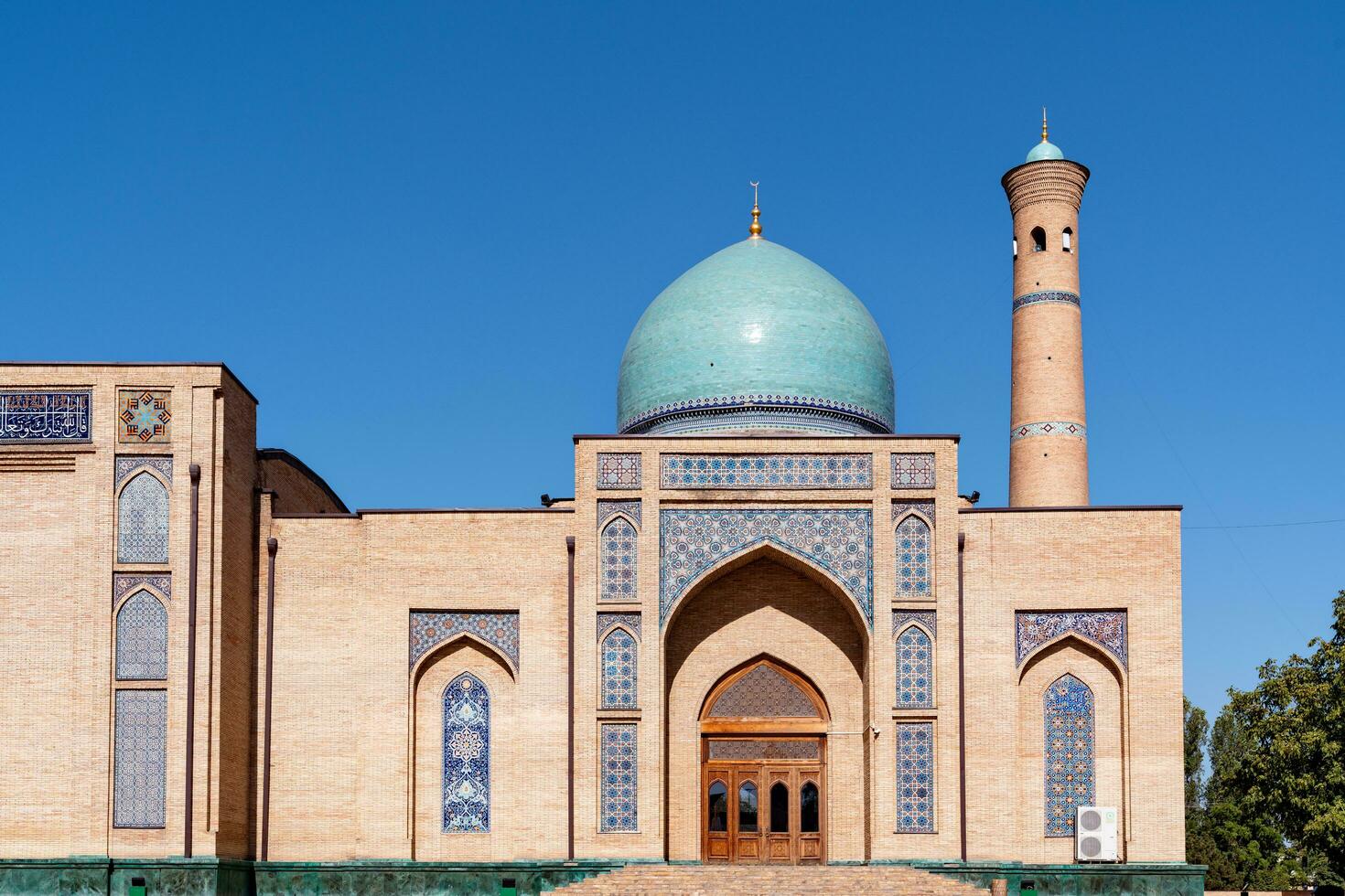 Tashkent, Uzbekistan-august 11, 2022-View of the Hazrati Imam complex during a sunny day.The complex is a square that includes a set of religious buildings in Tashkent photo