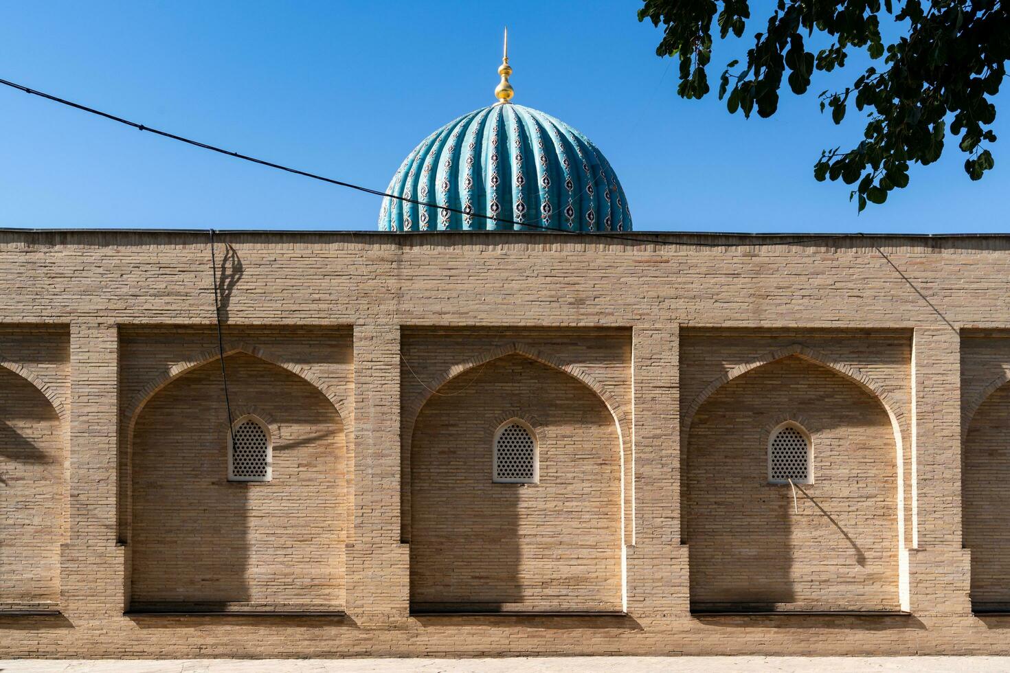 Tashkent, Uzbekistan-august 11, 2023-View of the Hazrati Imam complex during a sunny day.The complex is a square that includes a set of religious buildings in Tashkent photo