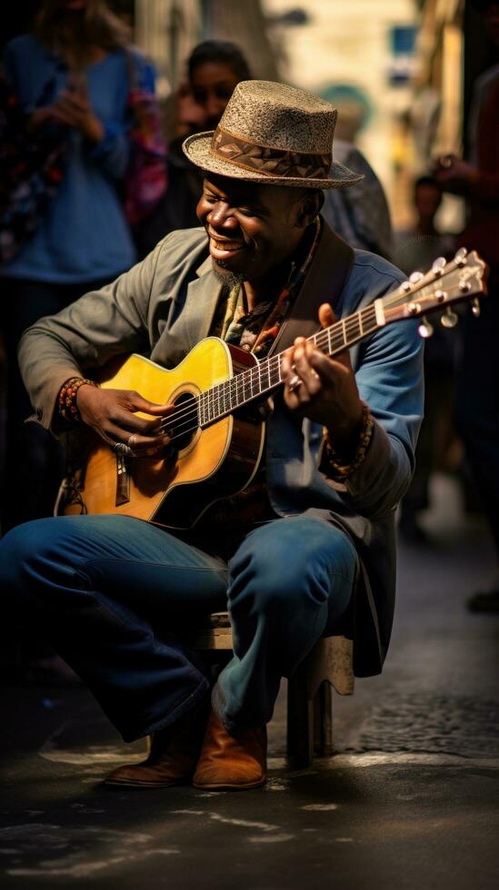 musician plays guitar on the street among a crowd of people photo