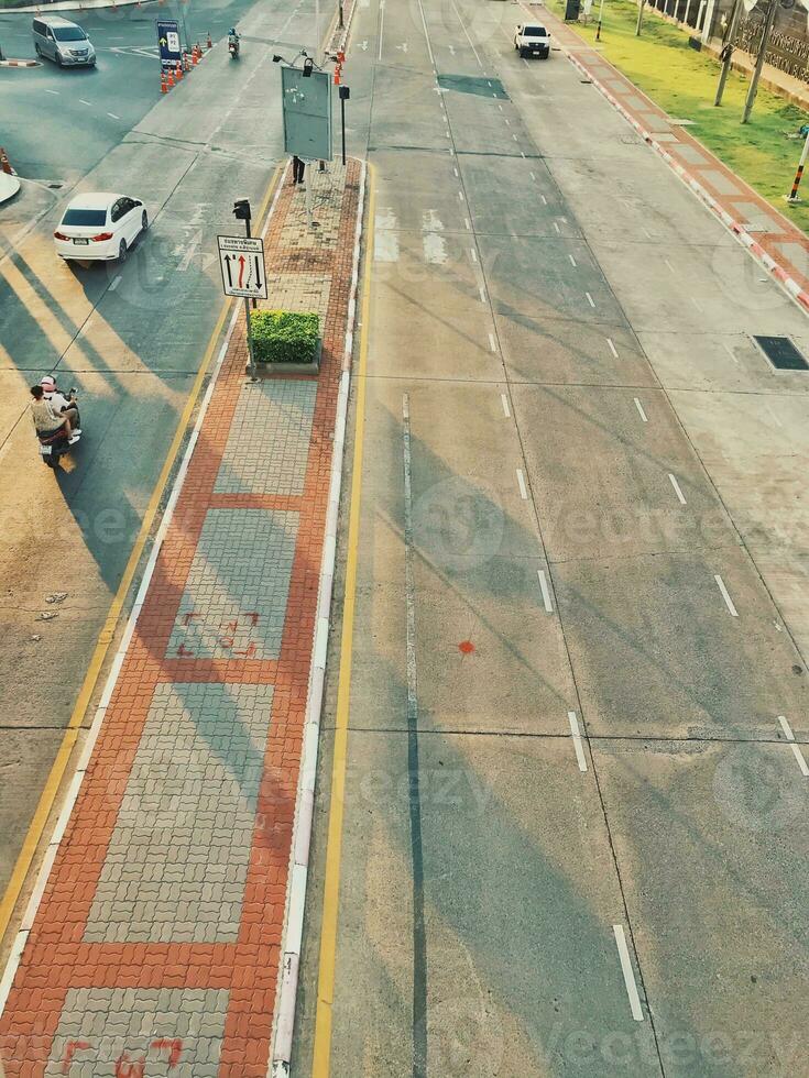 Aerial view of road at sunset. Top view in evening photo