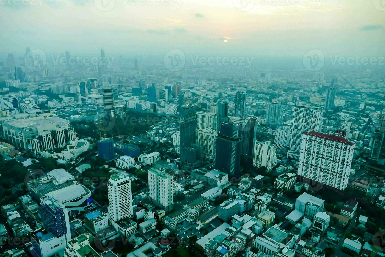 an aerial view of a city street with blue color photo