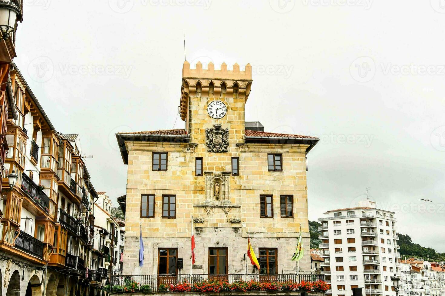 A city view with a clock tower photo