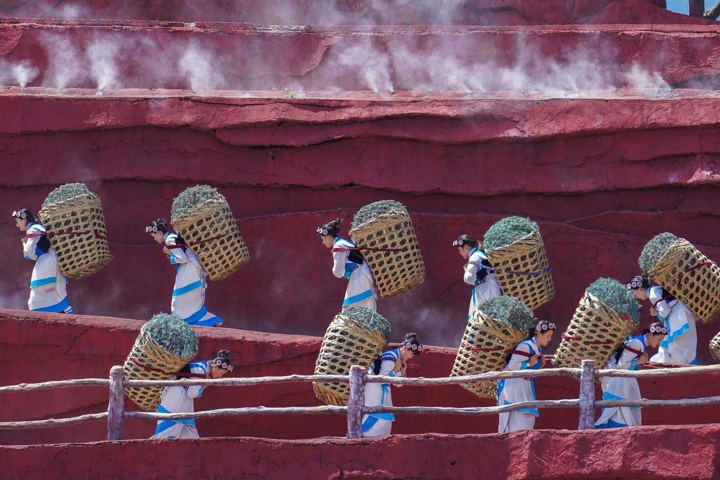 Lijiang ,China- SEP 04,2023 -Impression Lijiang is a grand traditional show located in the Jade Dragon Snow Mountain scenic area, Lijiang, Yunnan, China. photo