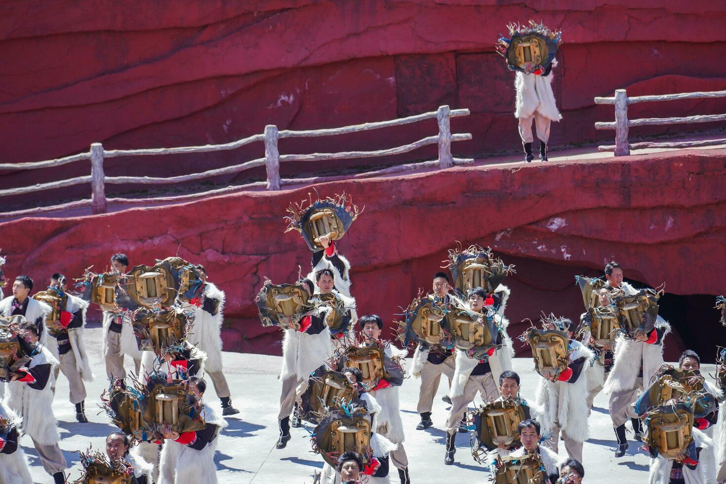 Lijiang ,China- SEP 04,2023 -Impression Lijiang is a grand traditional show located in the Jade Dragon Snow Mountain scenic area, Lijiang, Yunnan, China. photo