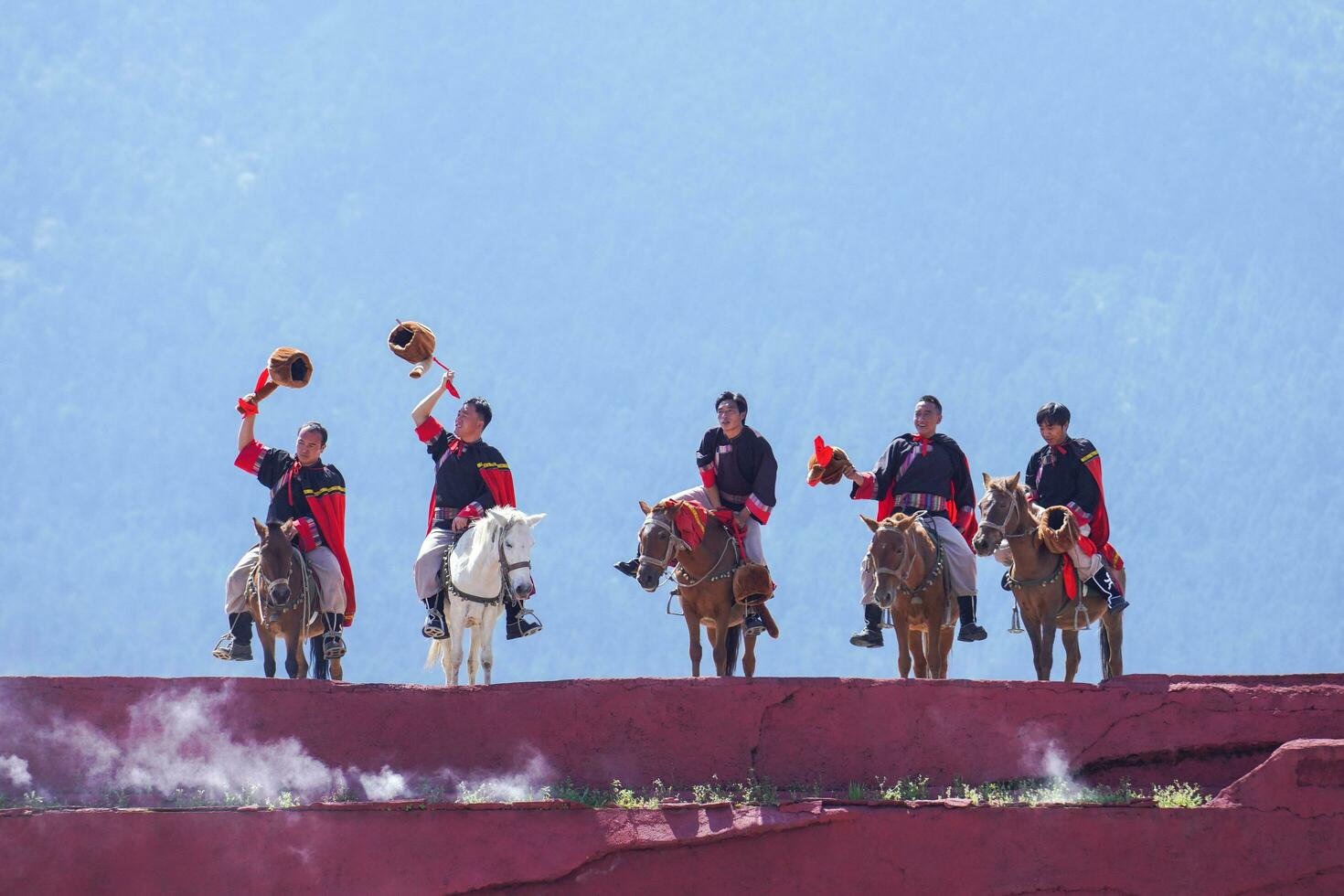 Lijiang ,China- SEP 04,2023 -Impression Lijiang is a grand traditional show located in the Jade Dragon Snow Mountain scenic area, Lijiang, Yunnan, China. photo