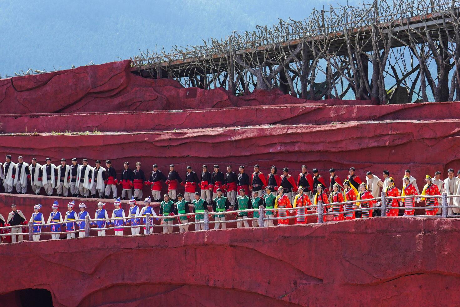 Lijiang ,China- SEP 04,2023 -Impression Lijiang is a grand traditional show located in the Jade Dragon Snow Mountain scenic area, Lijiang, Yunnan, China. photo