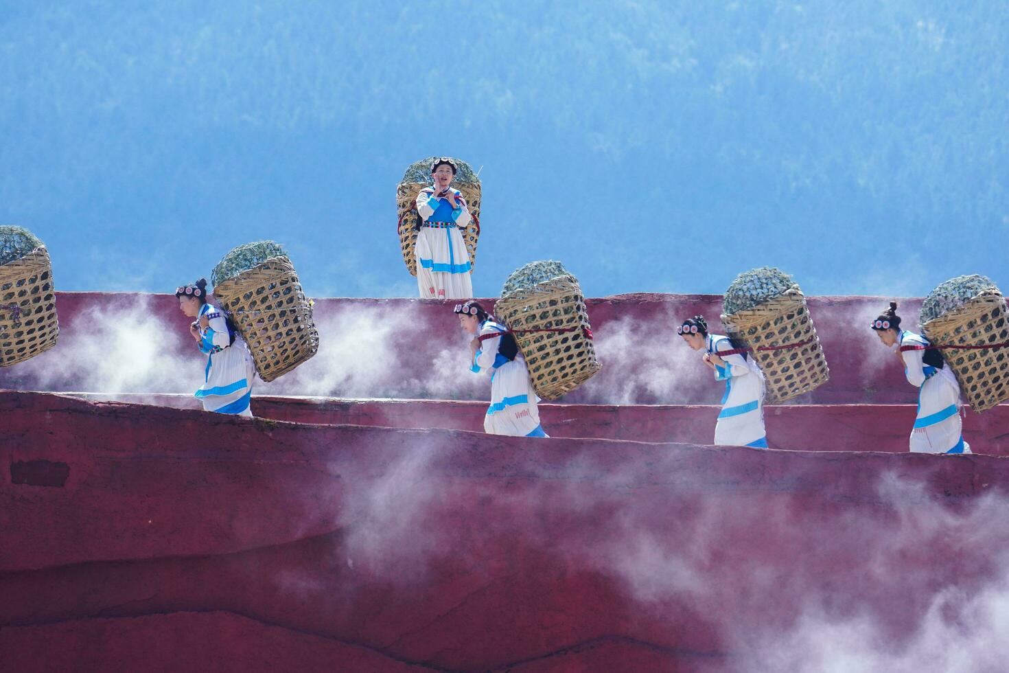 Lijiang ,China- SEP 04,2023 -Impression Lijiang is a grand traditional show located in the Jade Dragon Snow Mountain scenic area, Lijiang, Yunnan, China. photo