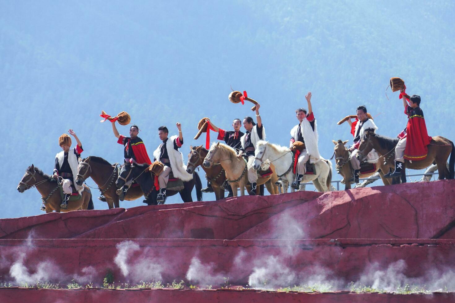 Lijiang ,China- SEP 04,2023 -Impression Lijiang is a grand traditional show located in the Jade Dragon Snow Mountain scenic area, Lijiang, Yunnan, China. photo