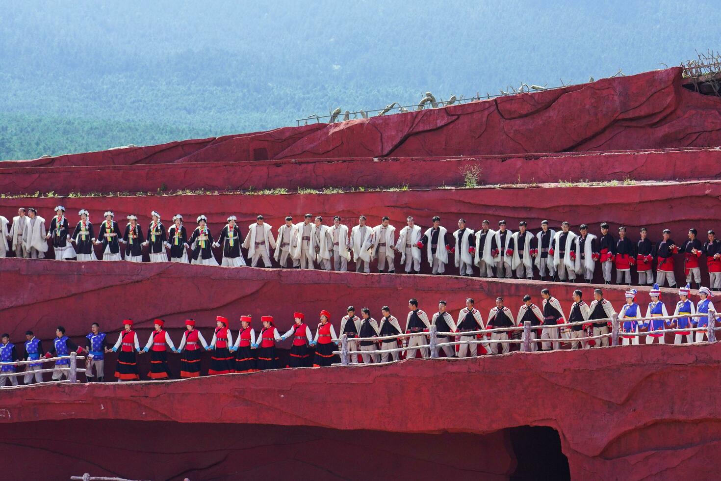 Lijiang ,China- SEP 04,2023 -Impression Lijiang is a grand traditional show located in the Jade Dragon Snow Mountain scenic area, Lijiang, Yunnan, China. photo