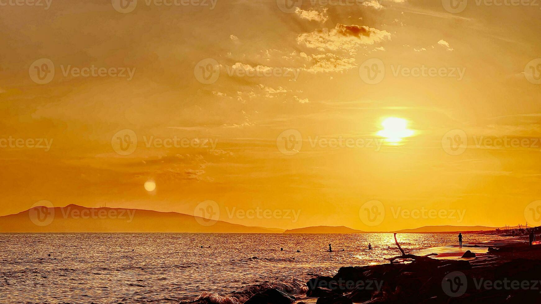 Red Sunset over the sea on a late summer day photo