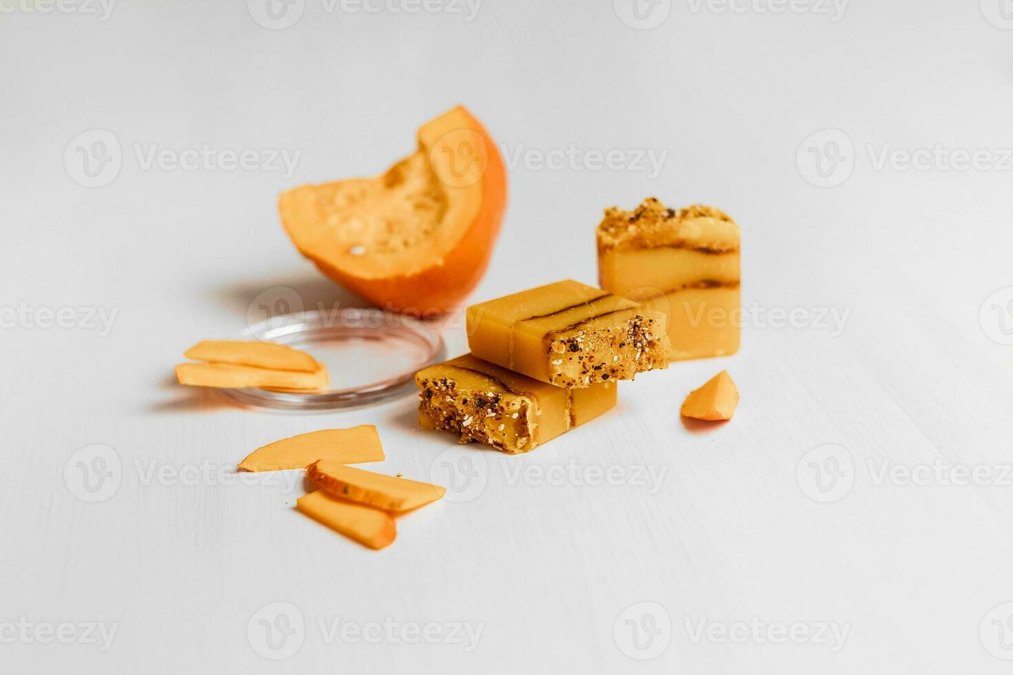 Christmas mockup concept pumpkin snacks on a white background. Pumpkin figuratively in a tray and new year decor photo
