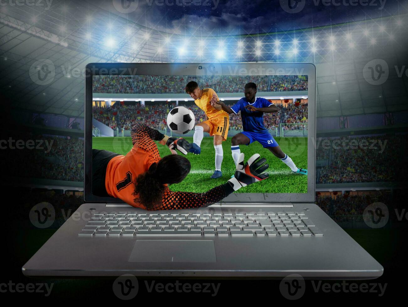 Live streaming of a soccer player match on a laptop photo