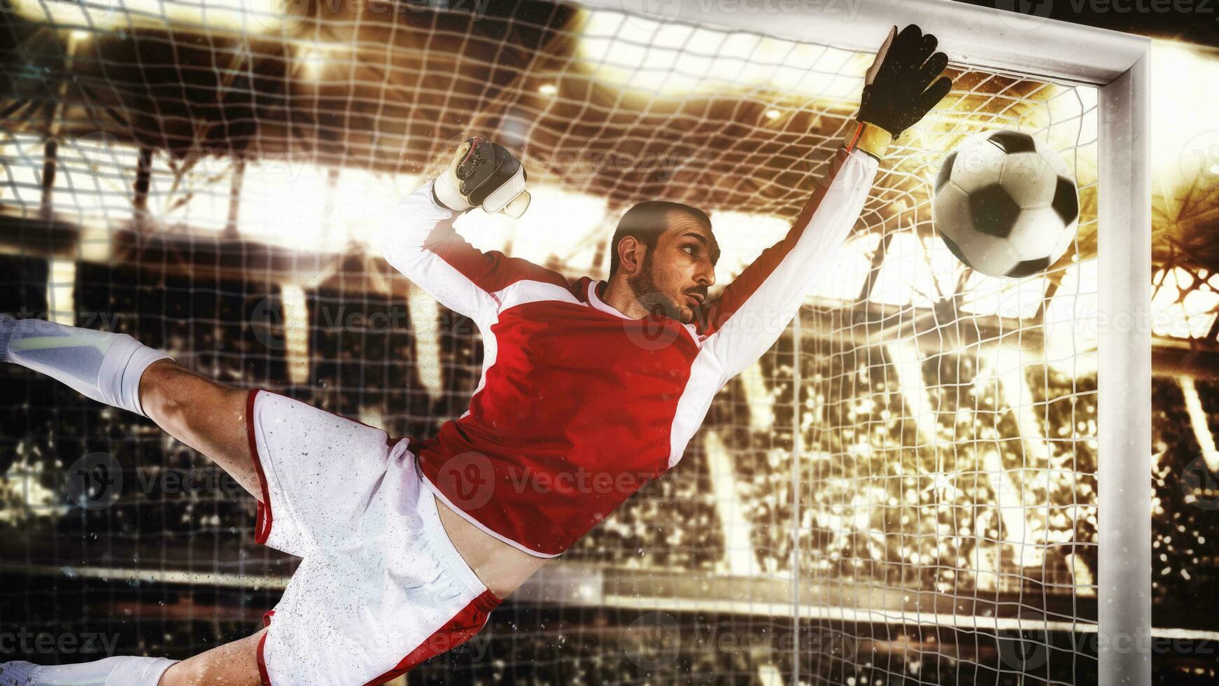 Close up of a soccer goalkeeper saving the ball at the corner of the goalposts photo