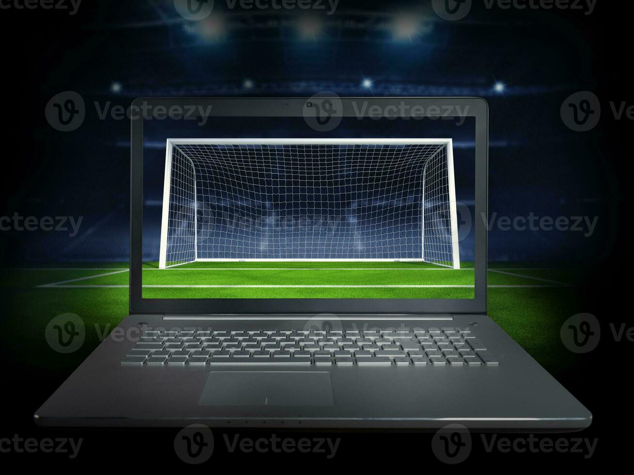 Live streaming of a soccer player match on a laptop photo