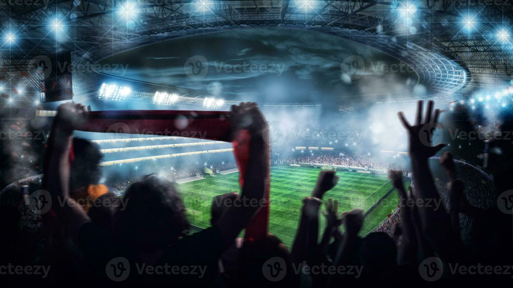 Football scene at night match with with cheering fans at the stadium photo