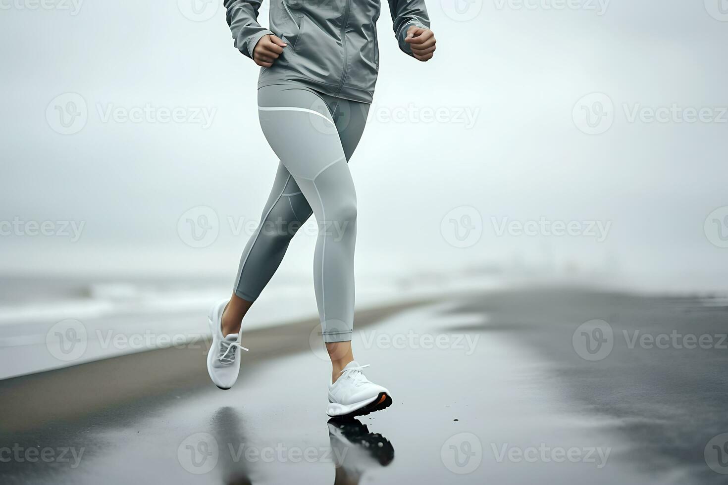 Woman in a gray tracksuit jogging along the seashore in cloudy foggy weather. AI Generative photo