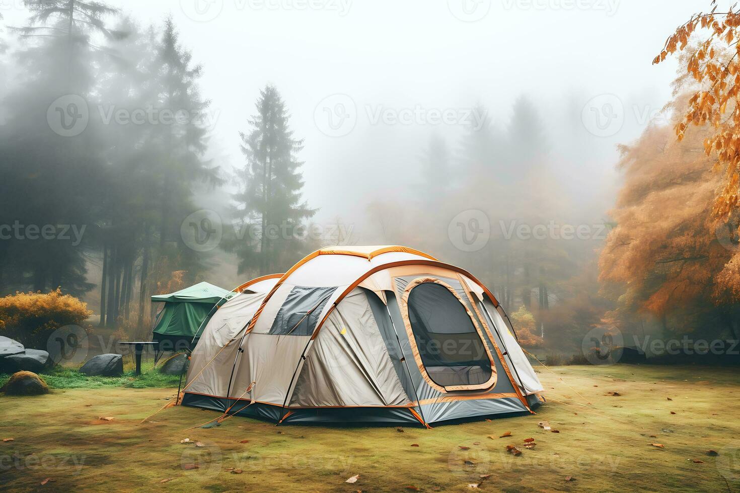 A large tourist tent stands on a lawn in the middle of a forest in autumn foggy weather. AI Generative photo