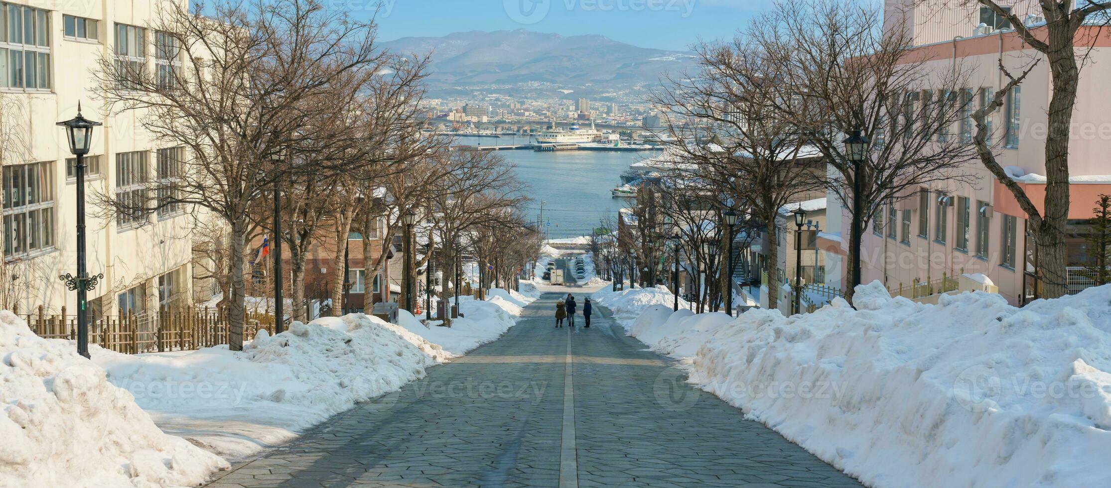 Hachiman Zaka Slope with Snow in winter season. landmark and popular for attractions in Hokkaido, Japan. Travel and Vacation concept photo