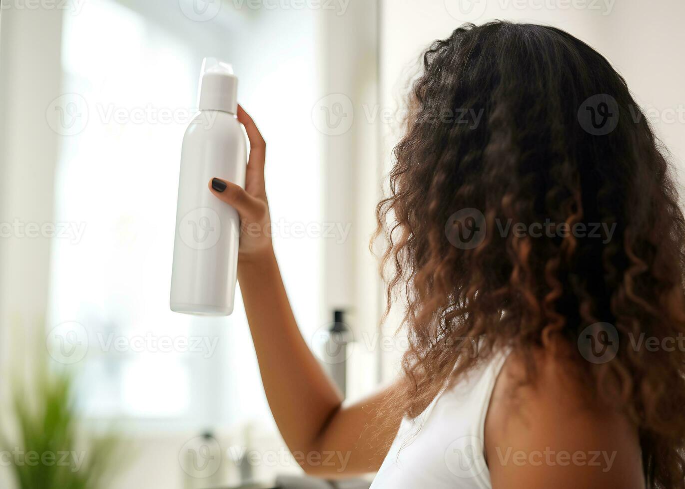 AI generative. A girl with curly hair stands with her back to the camera and holds in her hands a remedy for the unpleasant odor of the scalp and hair photo