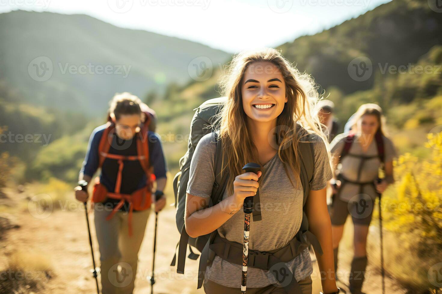 Smiling woman hiker with backpack looking at camera with group of friends hikers rises to the top of the hill. AI Generative photo