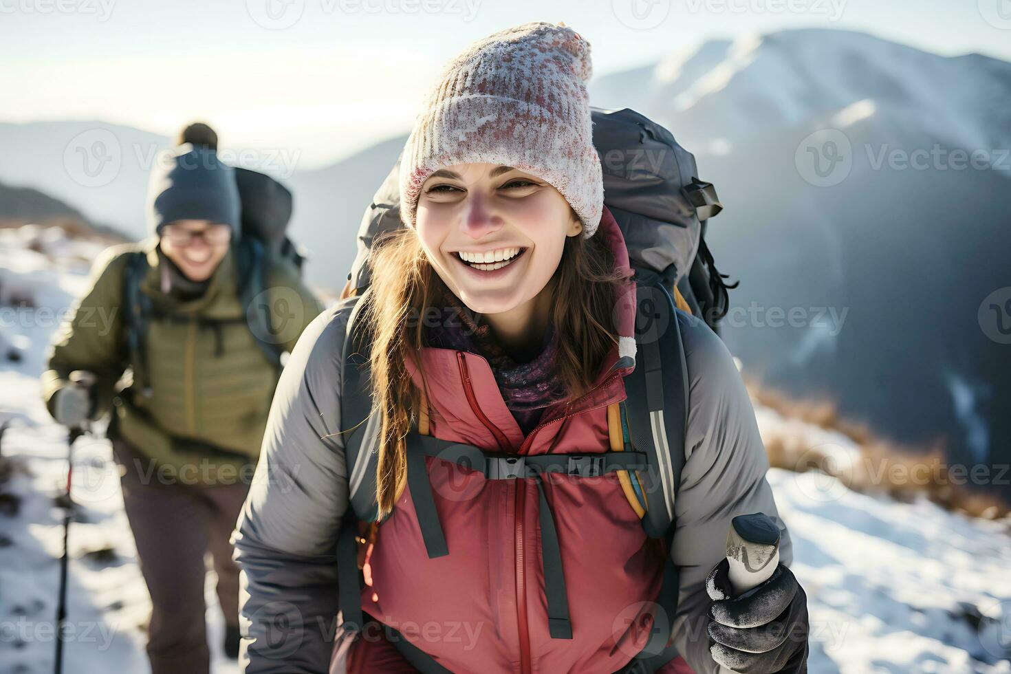 AI Generative. Couple of tourists in ski suits are climbing up at snow-covered mountain trail against the backdrop of a beautiful winter mountain landscape. photo