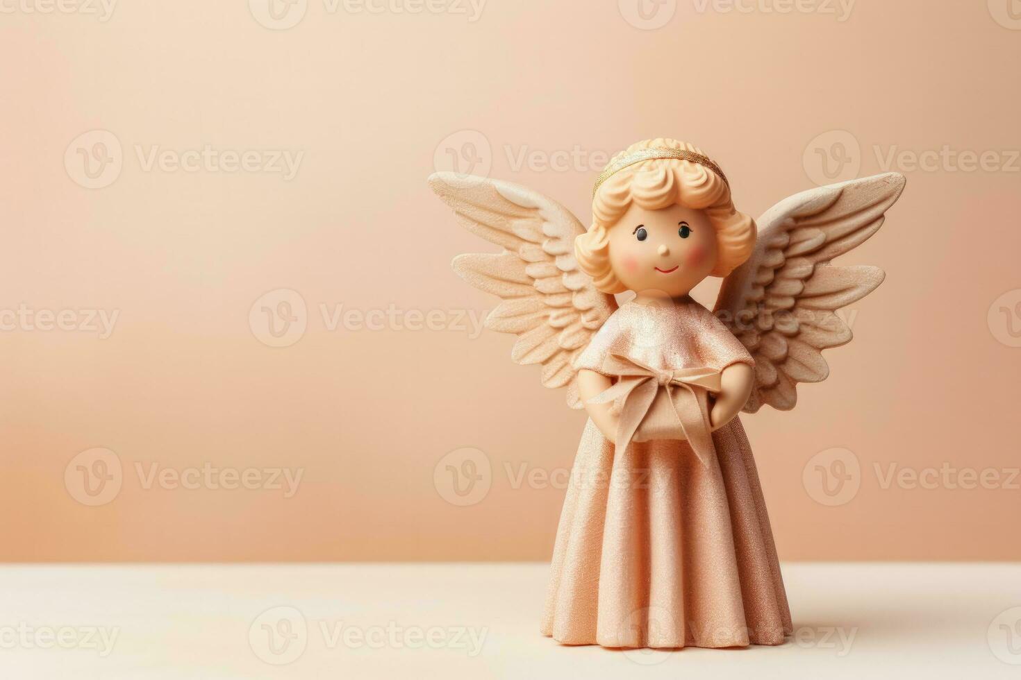 Christmas Angel isolated on a pastel background photo