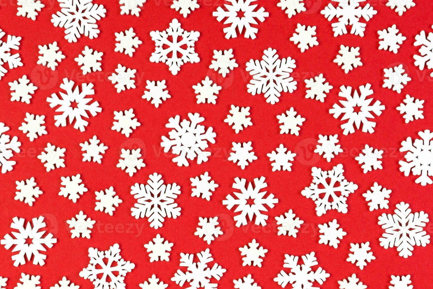 Top view of winter ornament made of white snowflakes on colorful background. Happy New Year concept with copy space photo