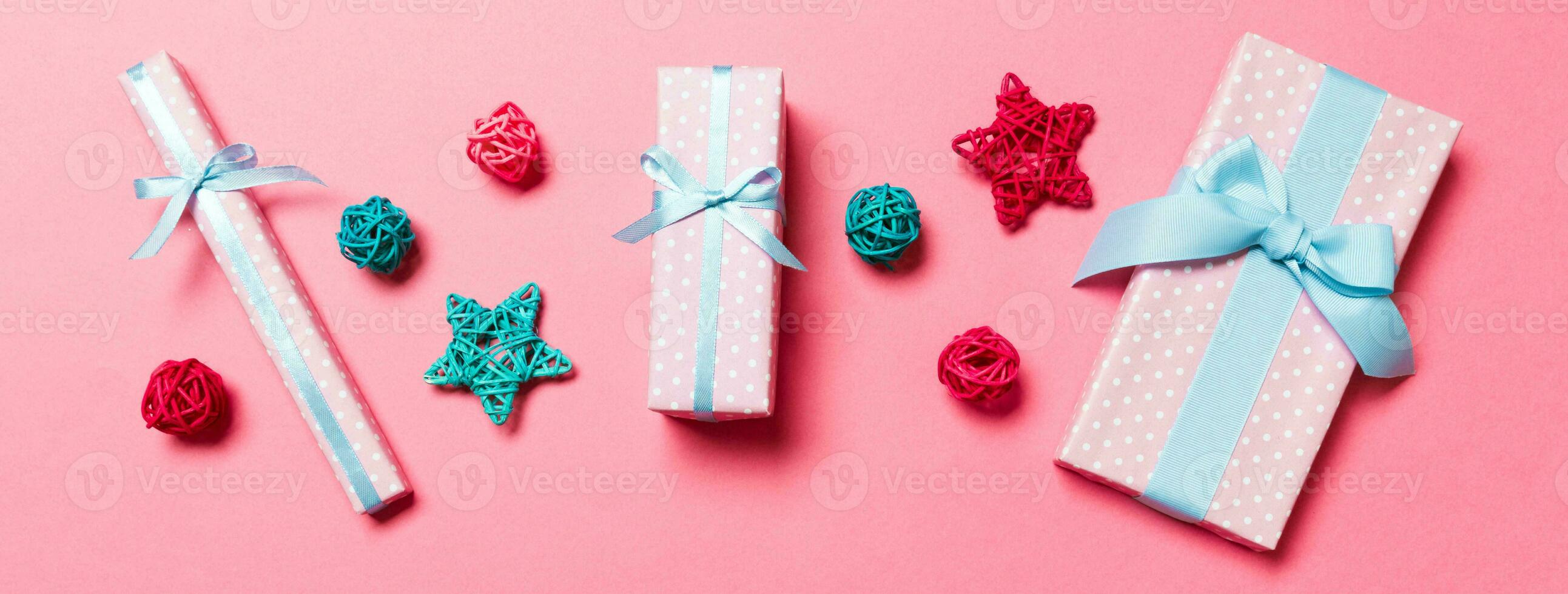 Top view Banner of Christmas decorations on pink background. New Year holiday concept with copy space photo