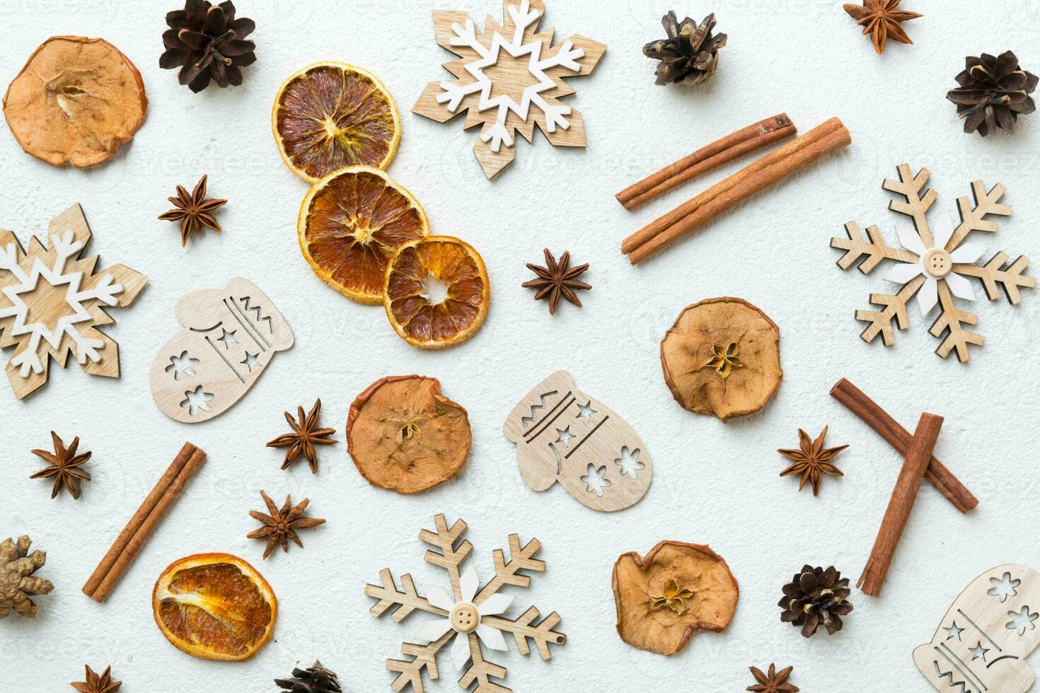 New Year composition. Christmas decor background with pine cones. Top view with copy space photo