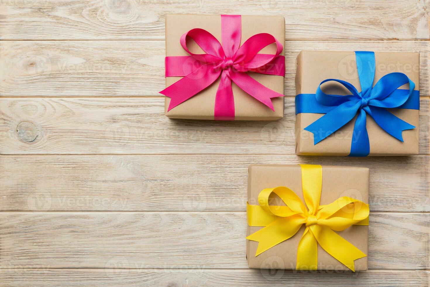 Collection of Holiday present boxes on a colored background. top view close up photo