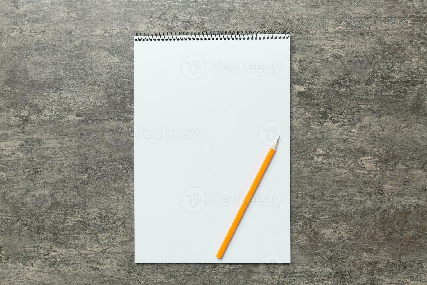 Blank notebook with pen on white background. Back to school and education concept photo