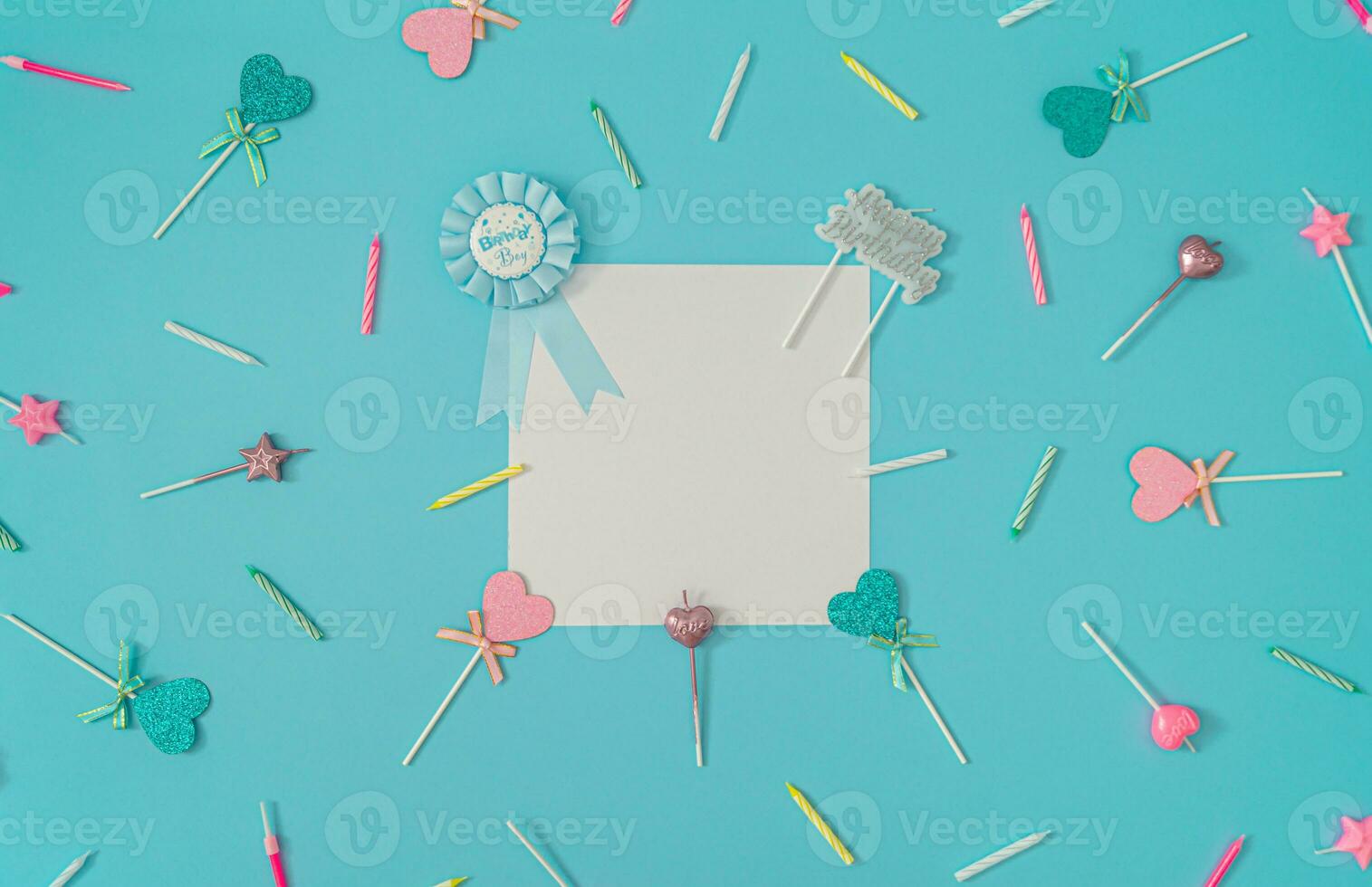 Pattern made of birthday party things on light blue background. Creative birthday boy concept. Minimal birthday party idea. Flat lay. Paper card copy space for text. photo