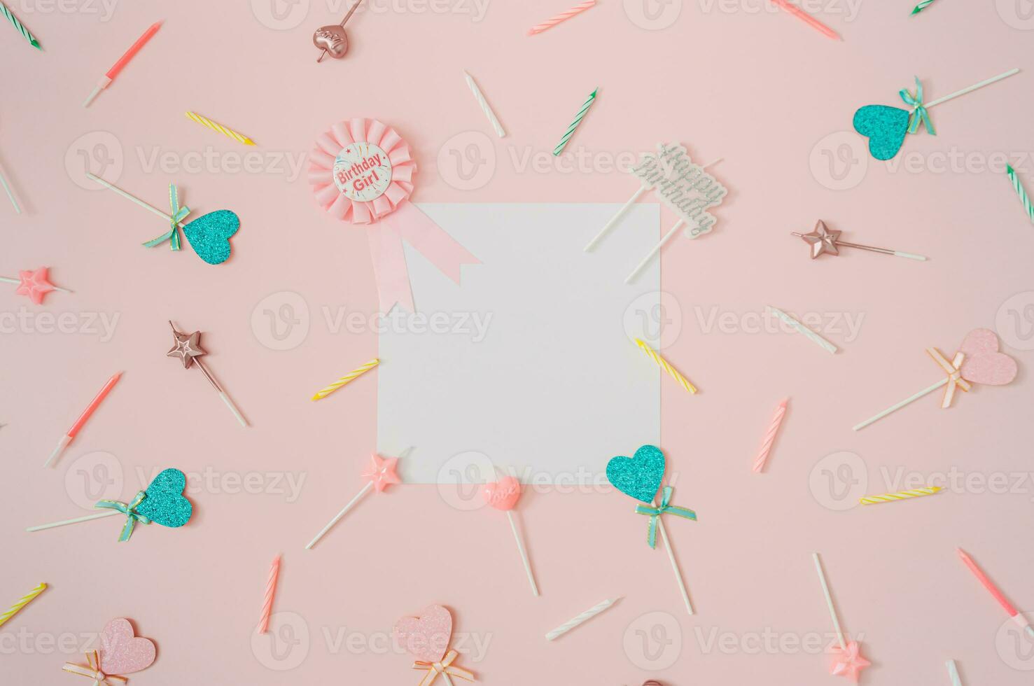 Pattern made of birthday party things on light pink background. Creative birthday girl concept. Minimal birthday party idea. Flat lay. Paper card copy space for text. photo