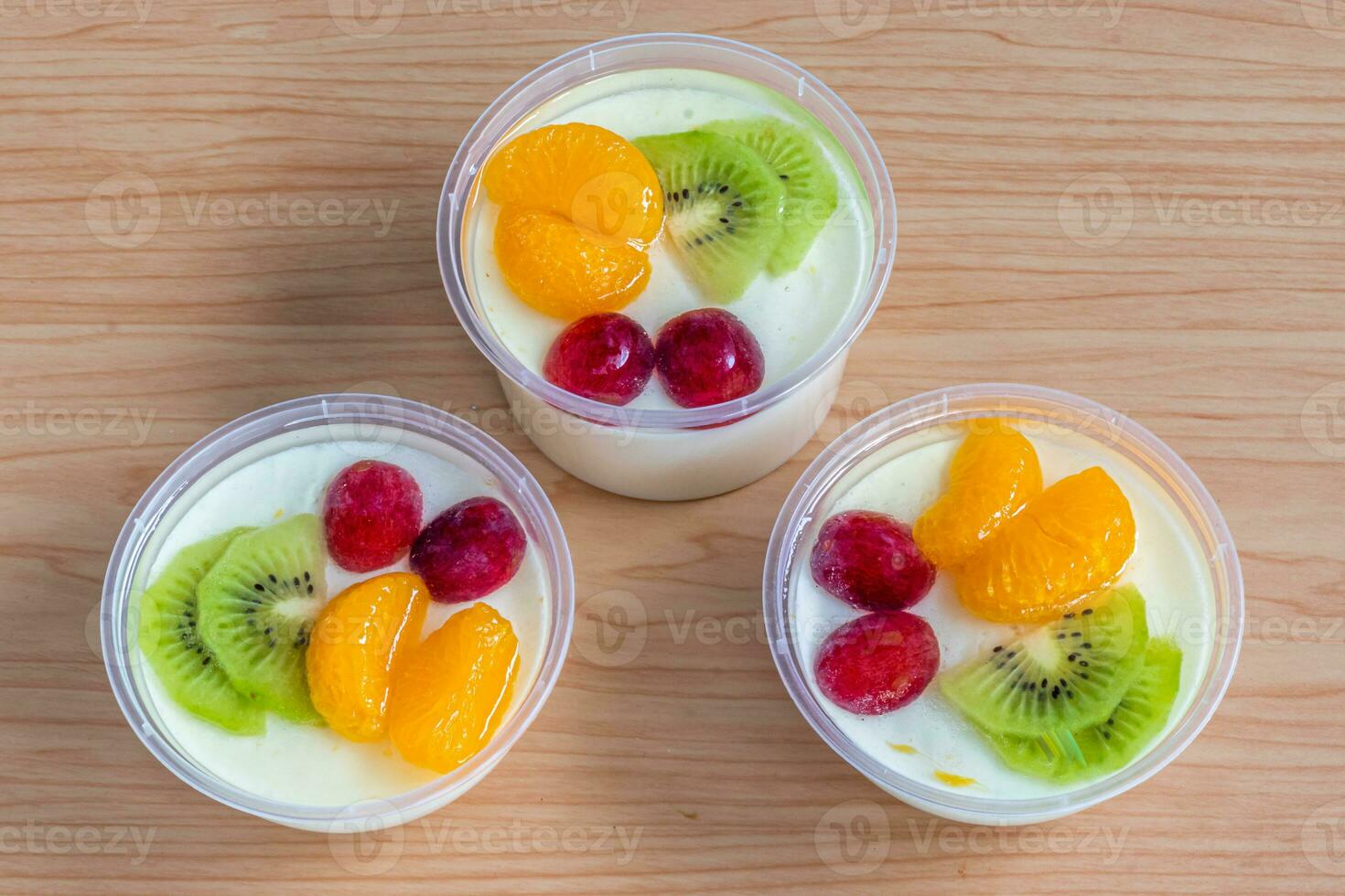 Fruity milk pudding, sweet chocolate silk pudding dessert with fruit topping photo