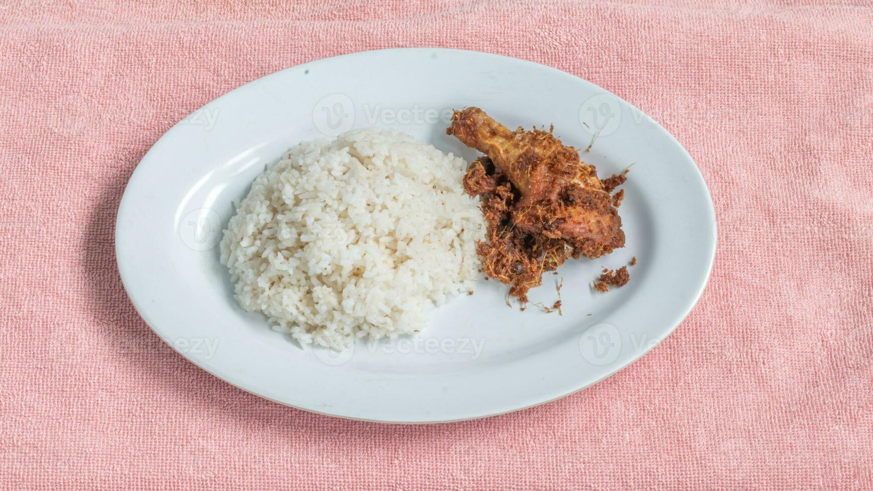 Ayam goreng Kalasan is a fried chicken dish with special spices originating from the Kalasan area, Sleman Yogyakarta. photo