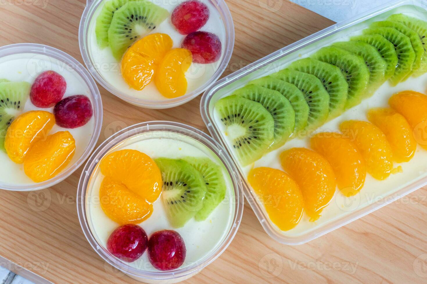 Fruity milk pudding, sweet chocolate silk pudding dessert with fruit topping photo