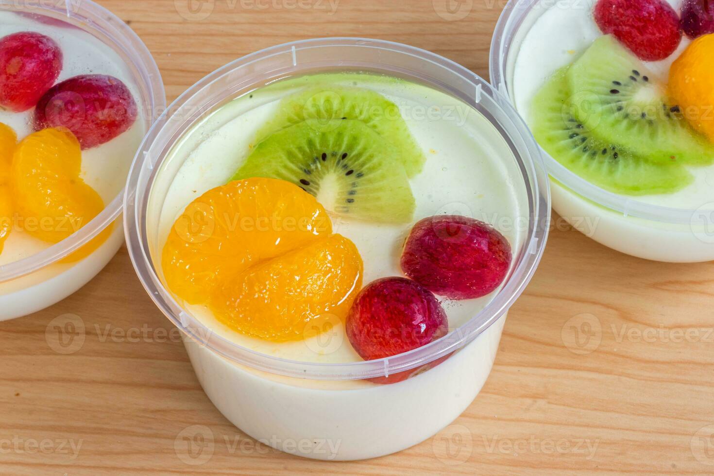 Fruity milk pudding, sweet chocolate silk pudding dessert with fruit topping photo