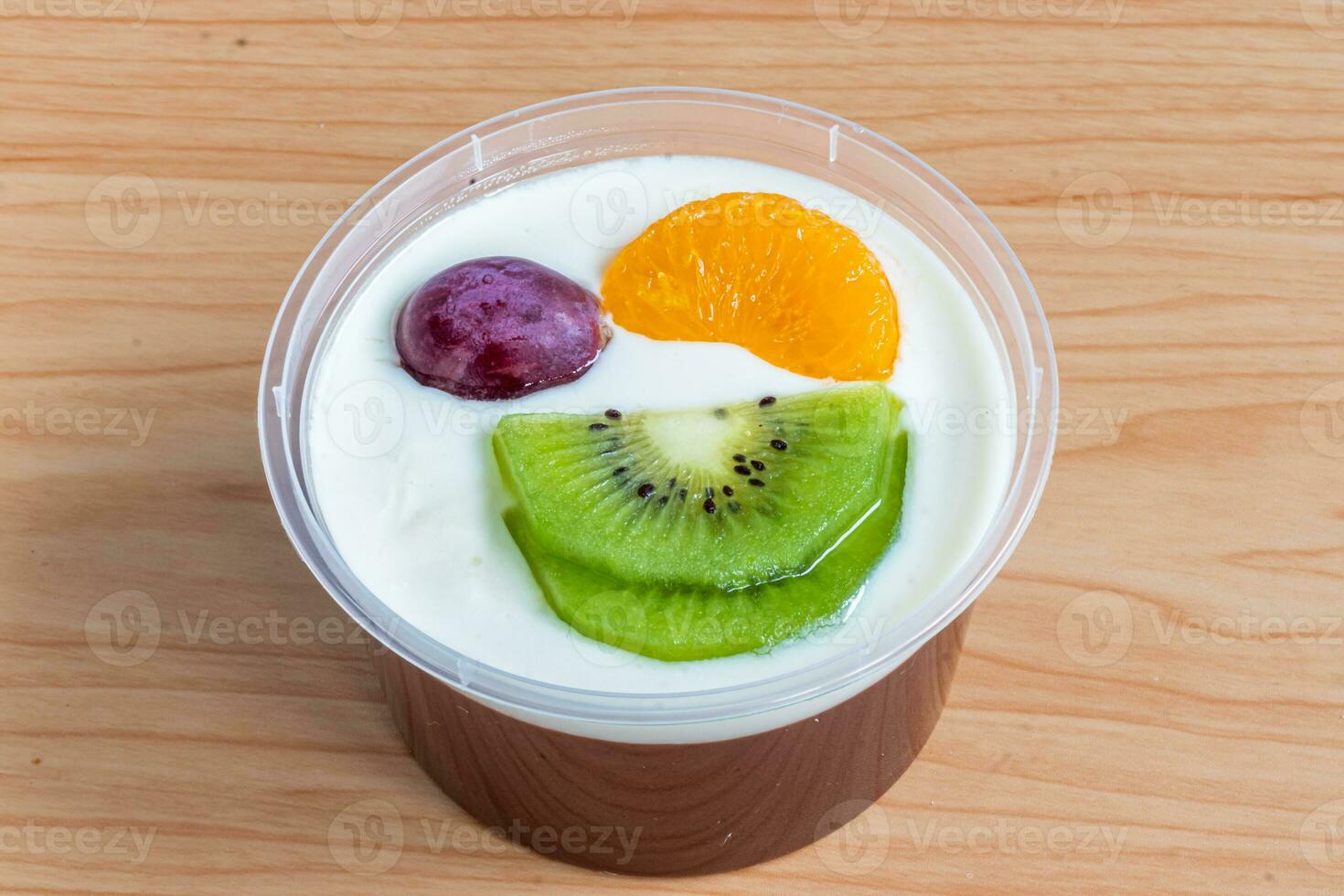 Fruity milk pudding, sweet chocolate silk pudding dessert with fruit topping photo