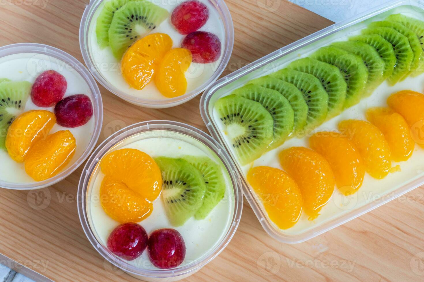 Fruity milk pudding, sweet chocolate silk pudding dessert with fruit topping photo