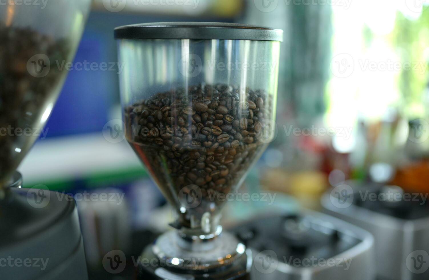 Coffee beans in a jar for grinding photo